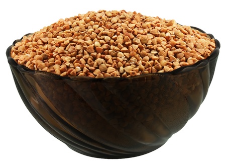 A bowl of buckwheat (kasha) on white.の写真素材