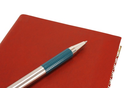 Pen and notebook, isolated on white background.の写真素材