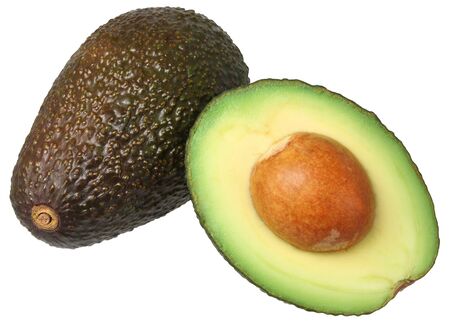 Whole and half avocado isolated on white.の写真素材