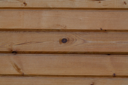 structural background of old, laminated, wooden board in a horizontal planeの写真素材