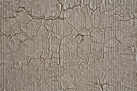 cracks, cobwebs wrapped around the wallの写真素材