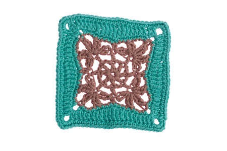 handmade napkin, crocheted with colorful threadsの写真素材