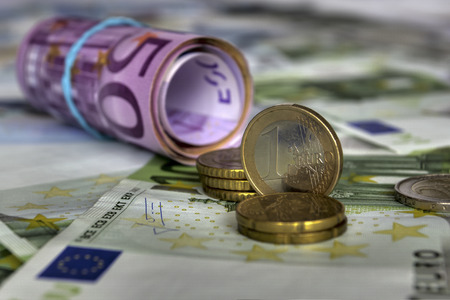 Investment concept. Euro coins and notes (EUR)の写真素材