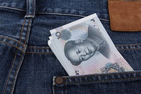 Chinese Money (10 RMB note) in a pocketの写真素材