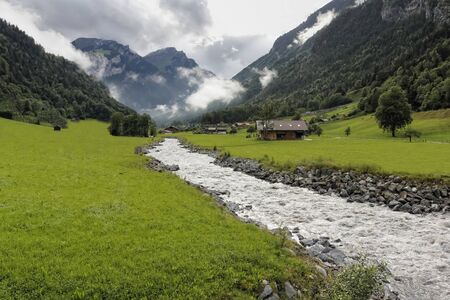 Creek in Oberland Switzerland, on a summer day.の写真素材