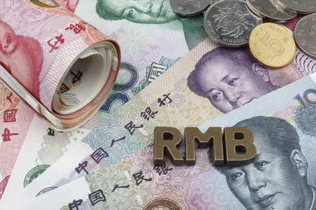 Chinese Yuan (CNY/RMB) banknotes with the letters RMB on top.の写真素材