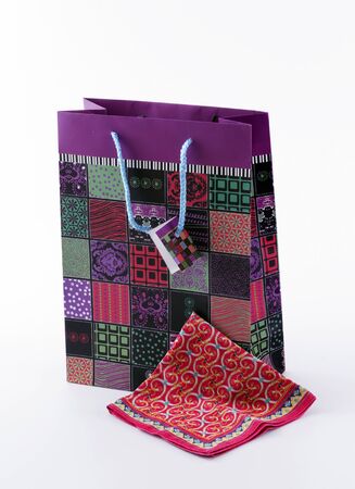 gift bag  and a handkerchief on a white backgroundの写真素材