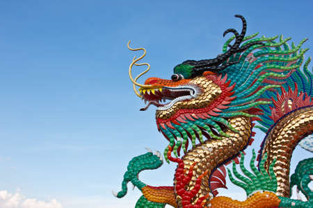 many color dragons on blue skyの写真素材