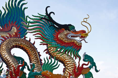 many color dragons on blue skyの写真素材