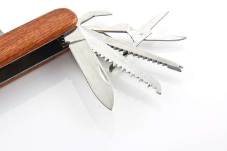 wood pocket knife in isolated whiteの写真素材