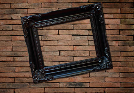 picture frame on brick wall の写真素材
