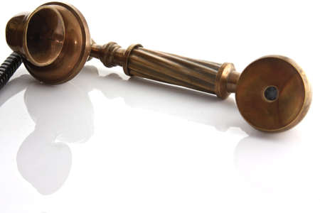 Old style phone isolated in white の写真素材