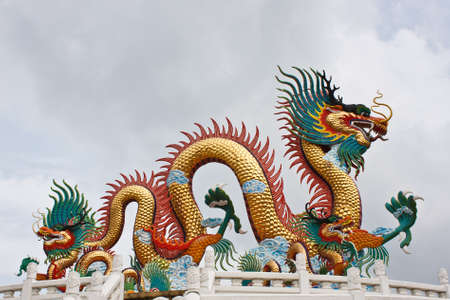 many color dragons on blue skyの写真素材