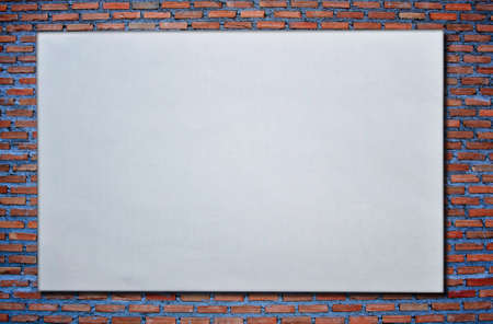 paper on brickwallの写真素材