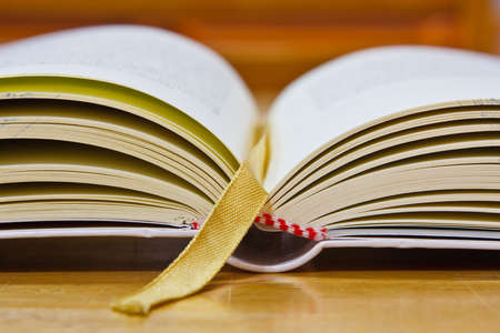 Education book on table in library 