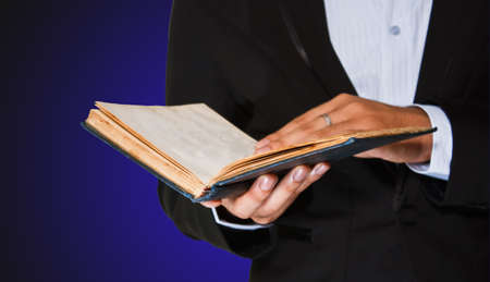 man reading a book isolated with pathの写真素材