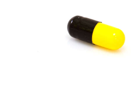 capsule pill on white isolated の写真素材