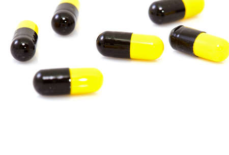 capsule pill on white isolated の写真素材