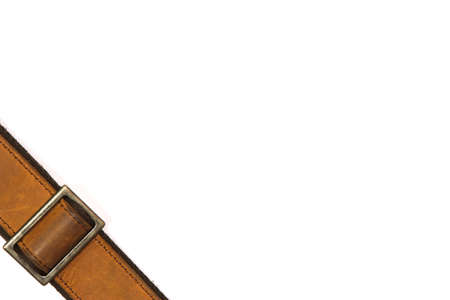Leather belt and fastener on white backgroundの写真素材