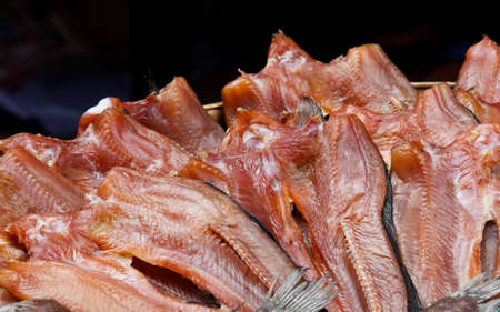 Dried fish on wood in market for sale