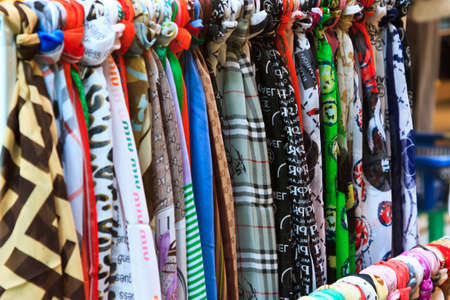 image of Colorful Textile Background,Pile of bright folded clothes の写真素材
