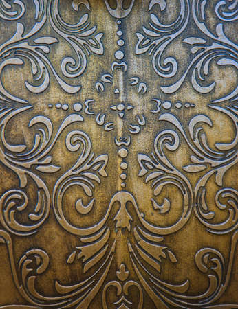 Gold metal plate with classic ornamentの写真素材
