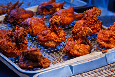 Fresh barbecue chicken on open grillの写真素材