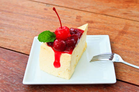 cup cheesecake on wooden backgroundの写真素材