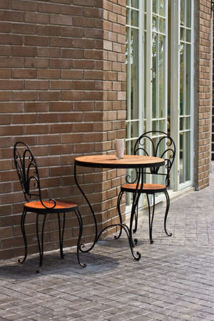 table with chair in the green gardenの写真素材