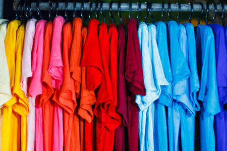 Variety of casual shirts on hangersの写真素材