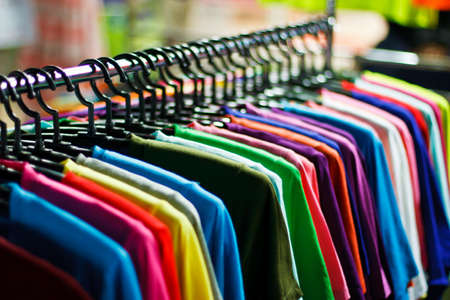 Variety of casual shirts on hangersの写真素材