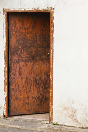 Old rusty metal doorの写真素材