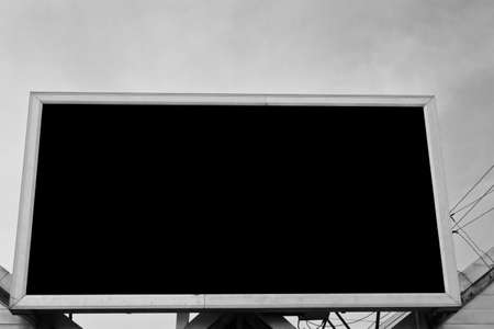 Blank billboard against blue sky Useful for your advertisement の写真素材