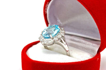ring of the jeweler with blue sapphire and brilliants on a white の写真素材