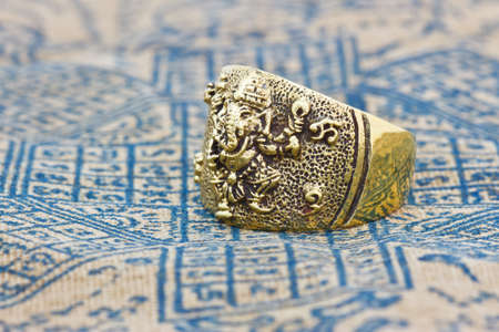 Hindu God Ganesh ring Statue on backgroundの写真素材
