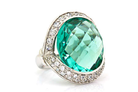 ring of the jeweler with blue sapphire and brilliants on a white backgroundの写真素材