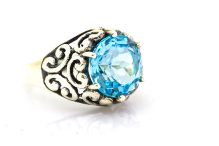 ring of the jeweler with blue sapphire and brilliants on a white backgroundの写真素材