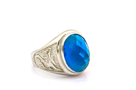 ring of the jeweler with blue sapphire and brilliants on a white backgroundの写真素材