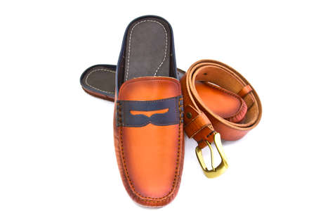 isolated stylish leather men's dress shoes and belt