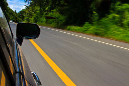 car on the road with motion blur background.の写真素材
