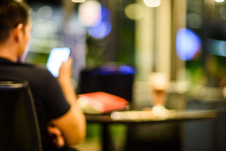 Vintage filter Customer in Coffee shop blur background with bokeh.の写真素材