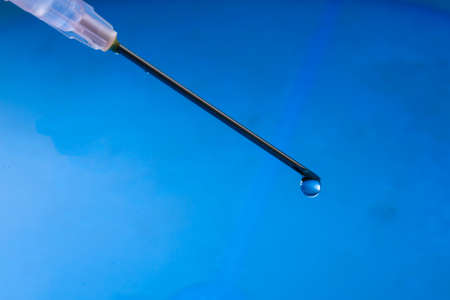 Blue Water drop splash backgroundの写真素材