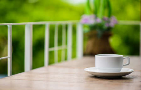 cup of coffee on table in cafeの写真素材