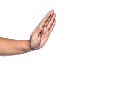 teen hand stop sign, isolated on whiteの写真素材