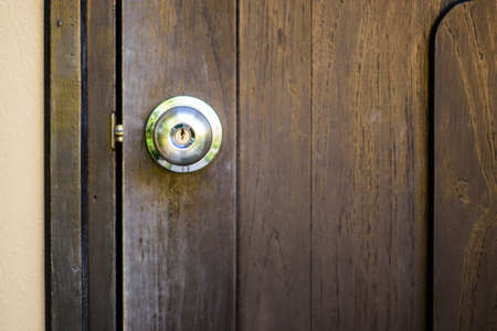knob on old wooden doorの写真素材