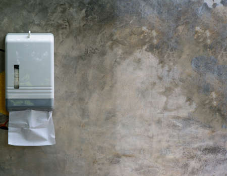 tissue paper  on grey stone wall backgroundの写真素材
