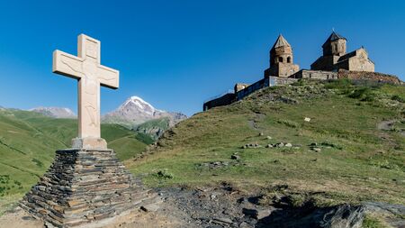 Gergeti, Georgia - August 5, 2015: The cross of the Gergeti Trinity Church