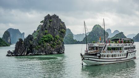 Ha Long Bay, Vietnam - December 02, 2015: Cruise boat near rock islands in Halong Bay, Vietnam, Southeast Asiaのeditorial素材