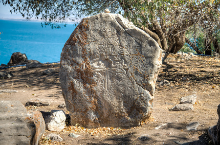 Van, Turkey - September 30, 2013: Tombstone at the graveyard  of The Cathedral of the Holy Cross (Akdamar Kilisesi) on Akdamar (Aghtamar) Islandのeditorial素材
