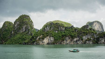 Ha Long Bay, Vietnam - December 02, 2015: Cruise boat near rock islands in Halong Bay, Vietnam, Southeast Asiaのeditorial素材